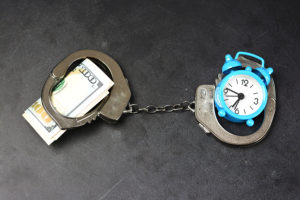 handcuffs money clock